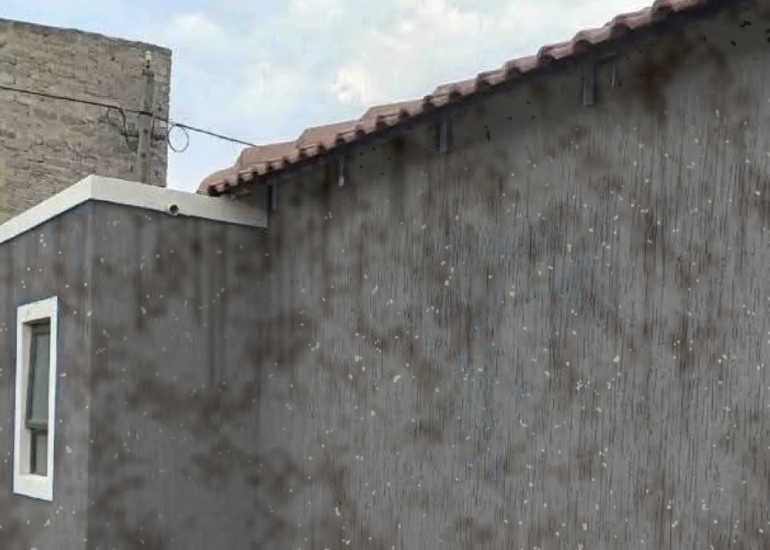 Before: faded, stained and flaking wall